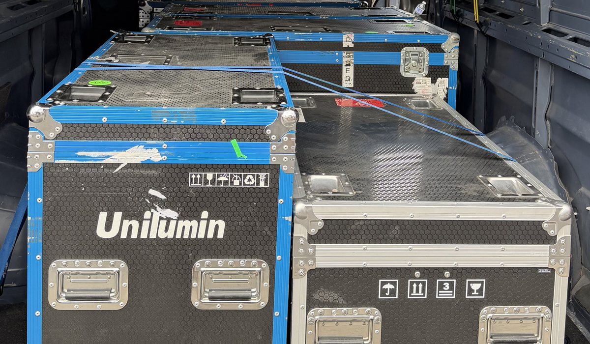 ProMilage van loaded with equipment cases for a delivery